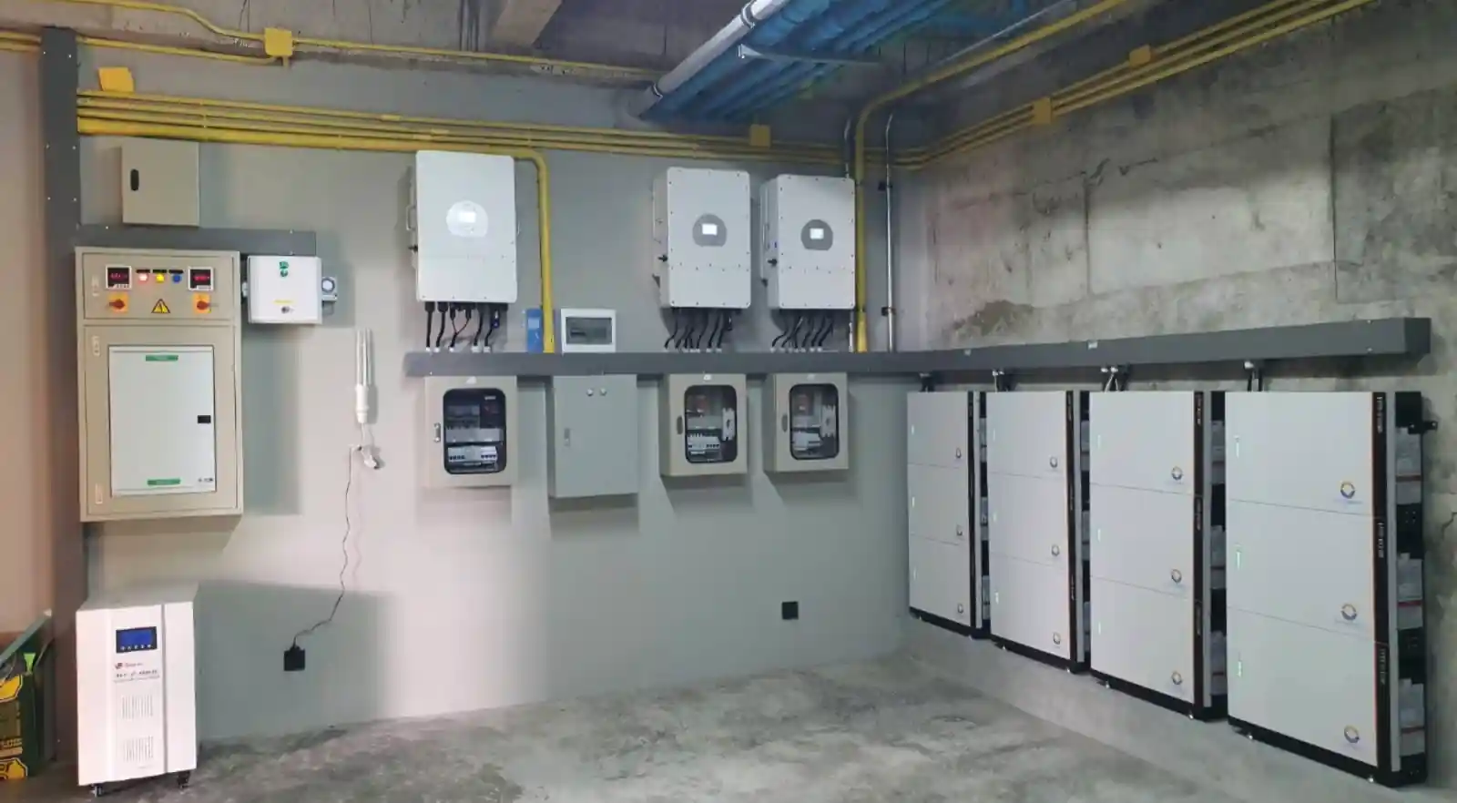 Commercial solar energy storage installation with multiple battery units and inverters